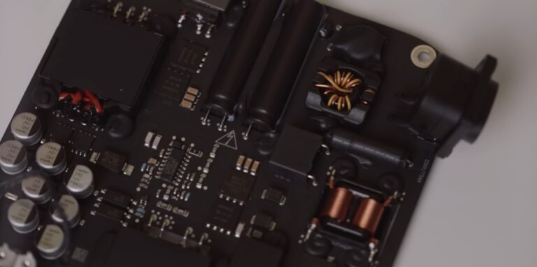 Apple’s New Mac mini Power Supply PCB Has Cutouts To House Components And Reduce The Height; A Costly Approach, But Necessary To Reduce The Overall Size